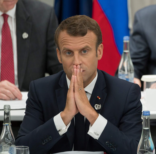 Emmanuel Macron Palms Together