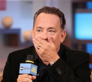 Tom Hanks Covering Mouth